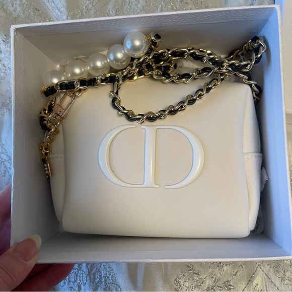 Dior Handbags - Christian Dior pouch converted into a crossbody white with gold/black chain
